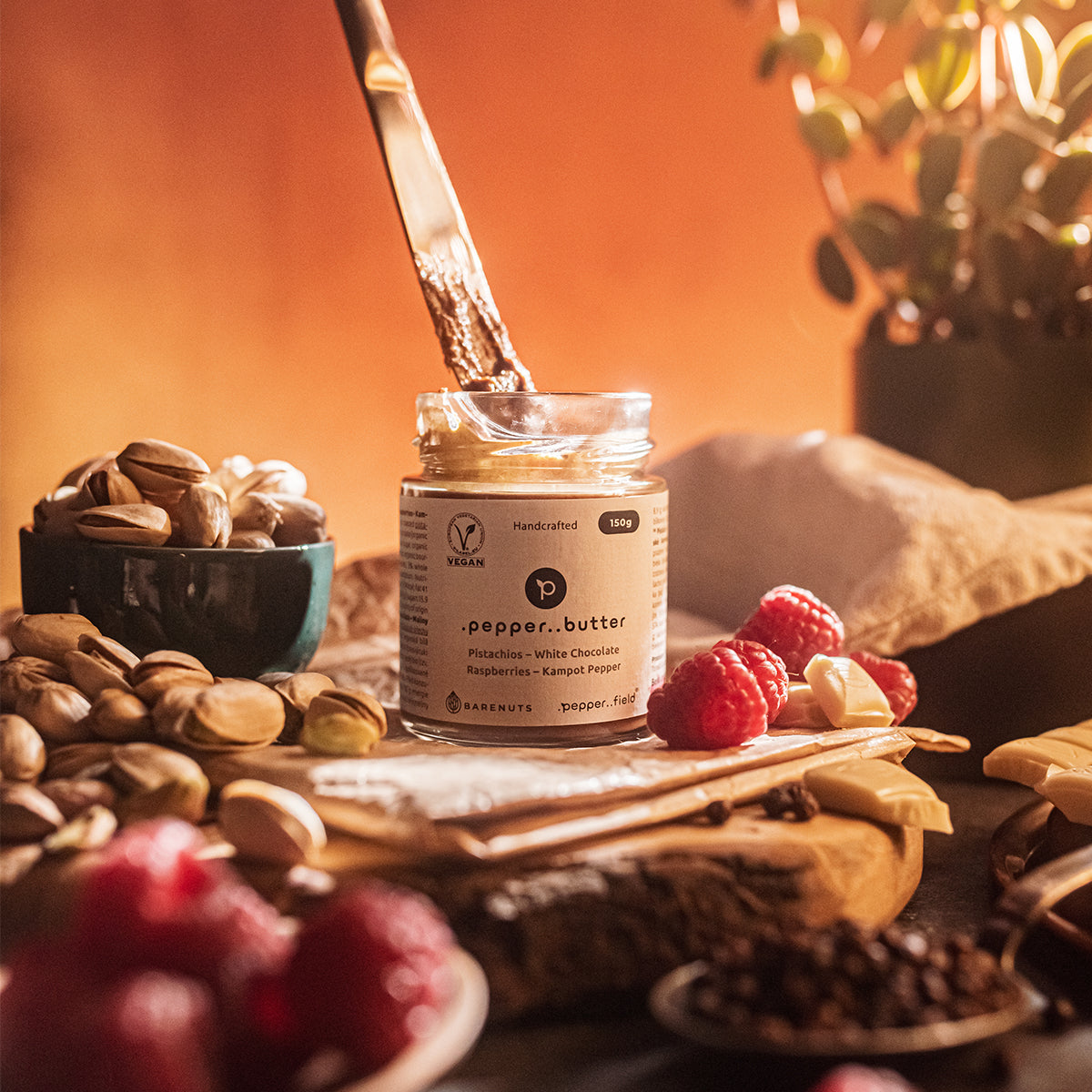Pistachio butter with white chocolate, raspberries, and Kampot m pepper 150 g