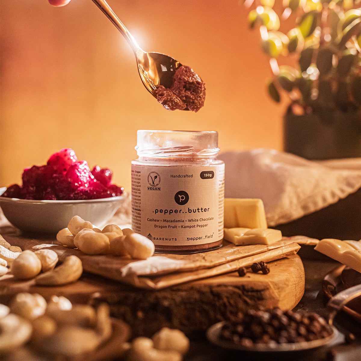 Butter with macadamia nuts, white chocolate, dragon fruit, and Kampot  pepper 150 g