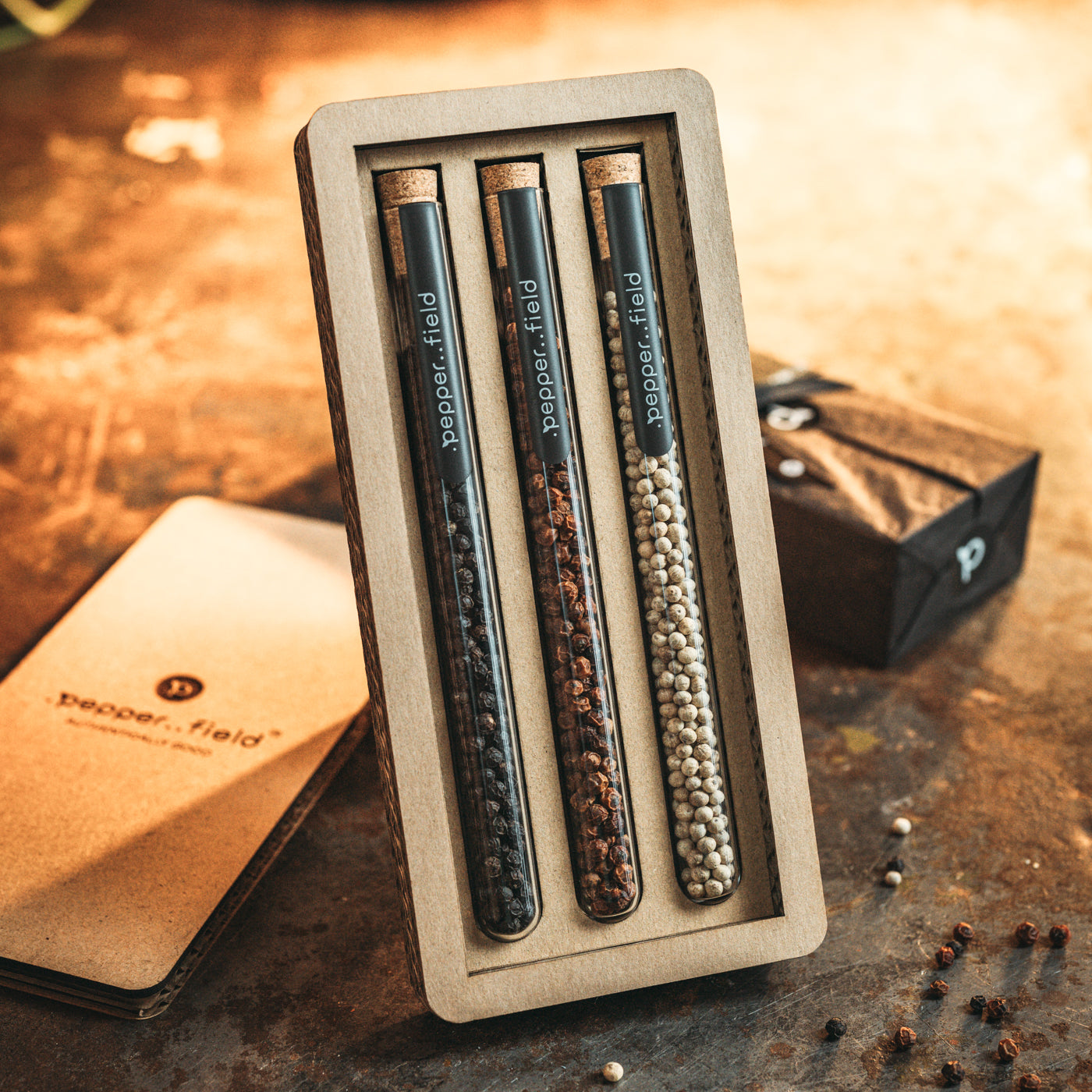 Set of small test tubes with 3 types of peppers in a gift box made of designer cardboard (3× 10 g)